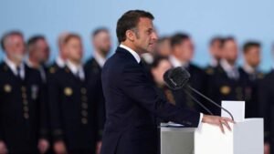 Emmanuel Macron speaking at the 80th D-Day celebration event 